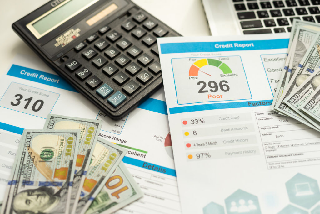 The image of the moeny and the calculator shows the effective use of disaster loans, showing homes being reconstructed, businesses reopening, and infrastructure being restored. Emphasis on strategic loan allocation to support long-term recovery and sustainable development.